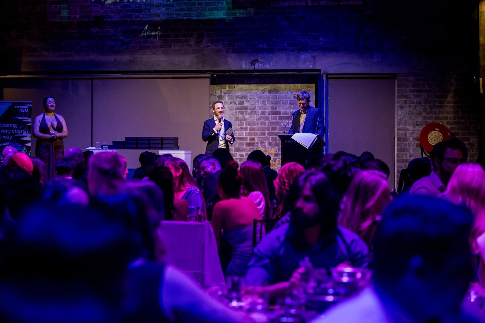 2025 Sydney Young Entrepreneur Awards Gala Dinner Winners accepting trophies on stage at the 2025 Sydney Young Entrepreneur Awards